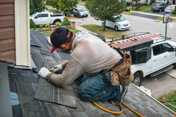Professional Gutter Installation technician working in Groveland, MA